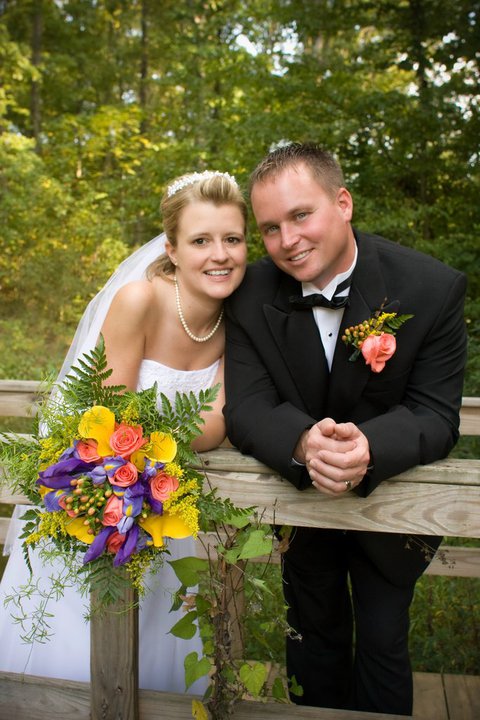 bride and groom smiling together