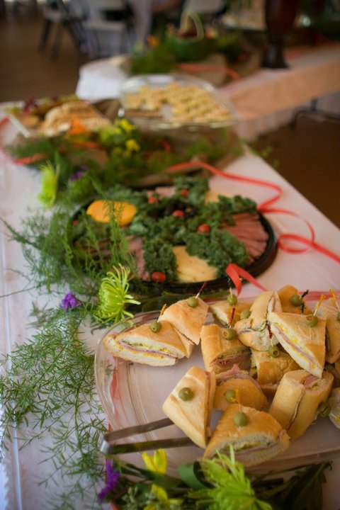 finger sandwiches and meat and cheese tray at wedding